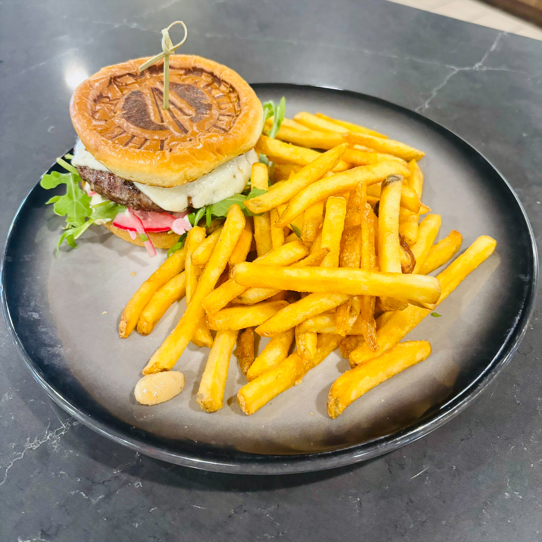 hamburger and fries on plate