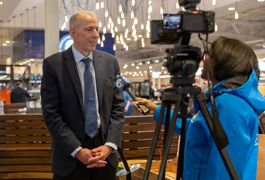 Schoolcraft College president speaking to media camera