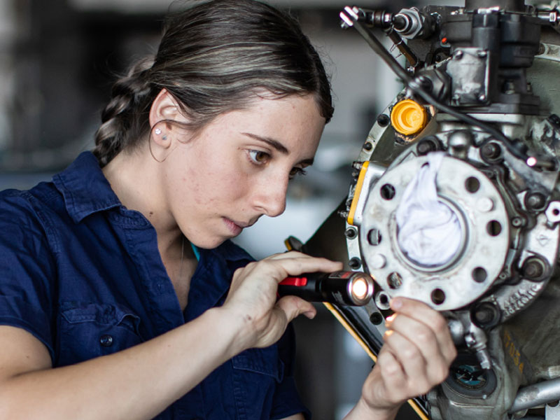 Skilled Trades Job Fair Thumbnail Image (Woman Inspecting Engine)