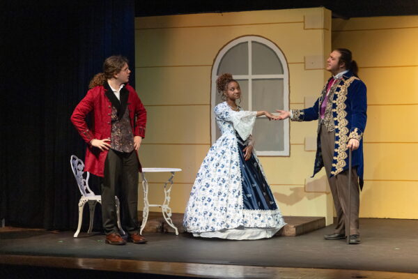 stage actors interacting , in renaissance theme