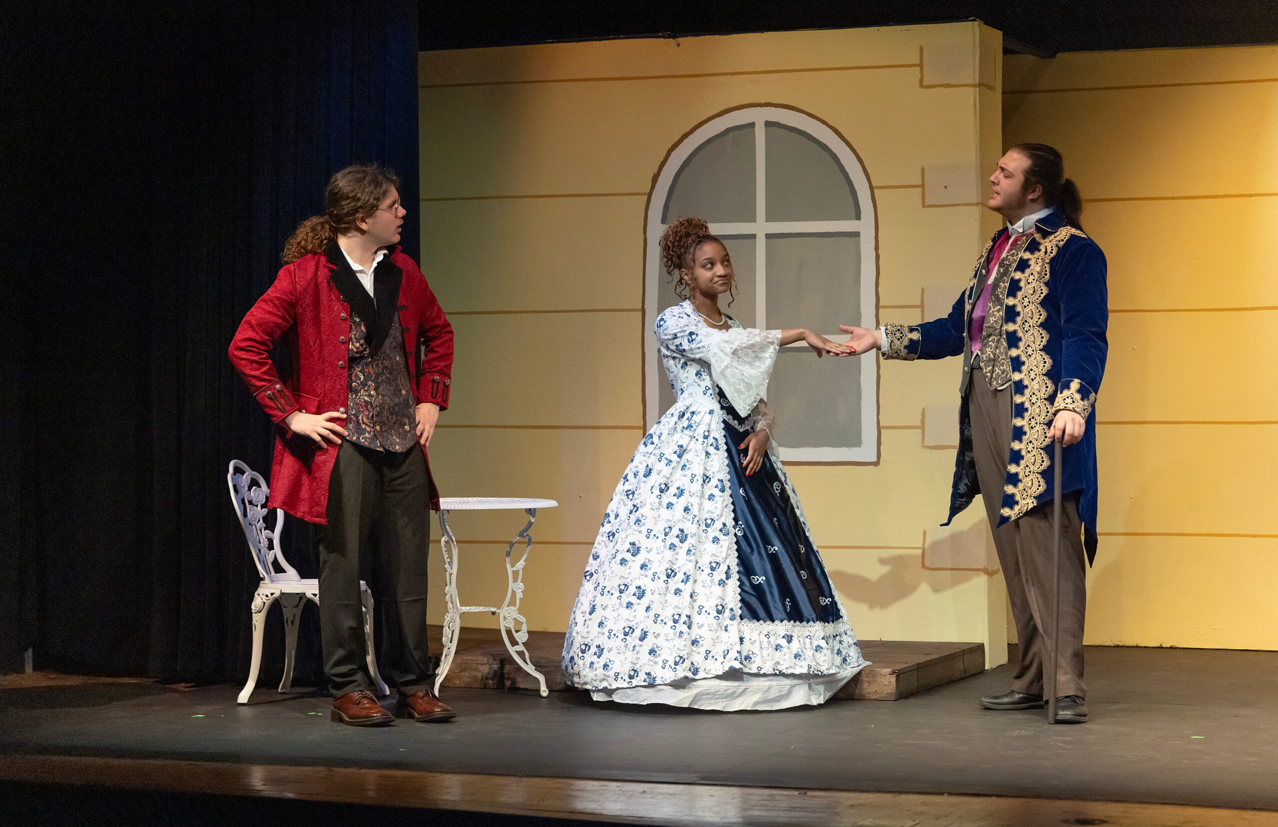 stage actors interacting , in renaissance theme