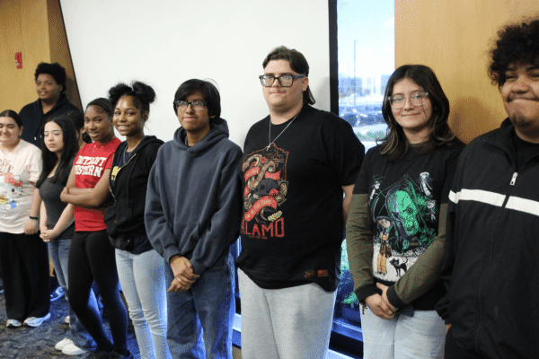 Group of students standing in row