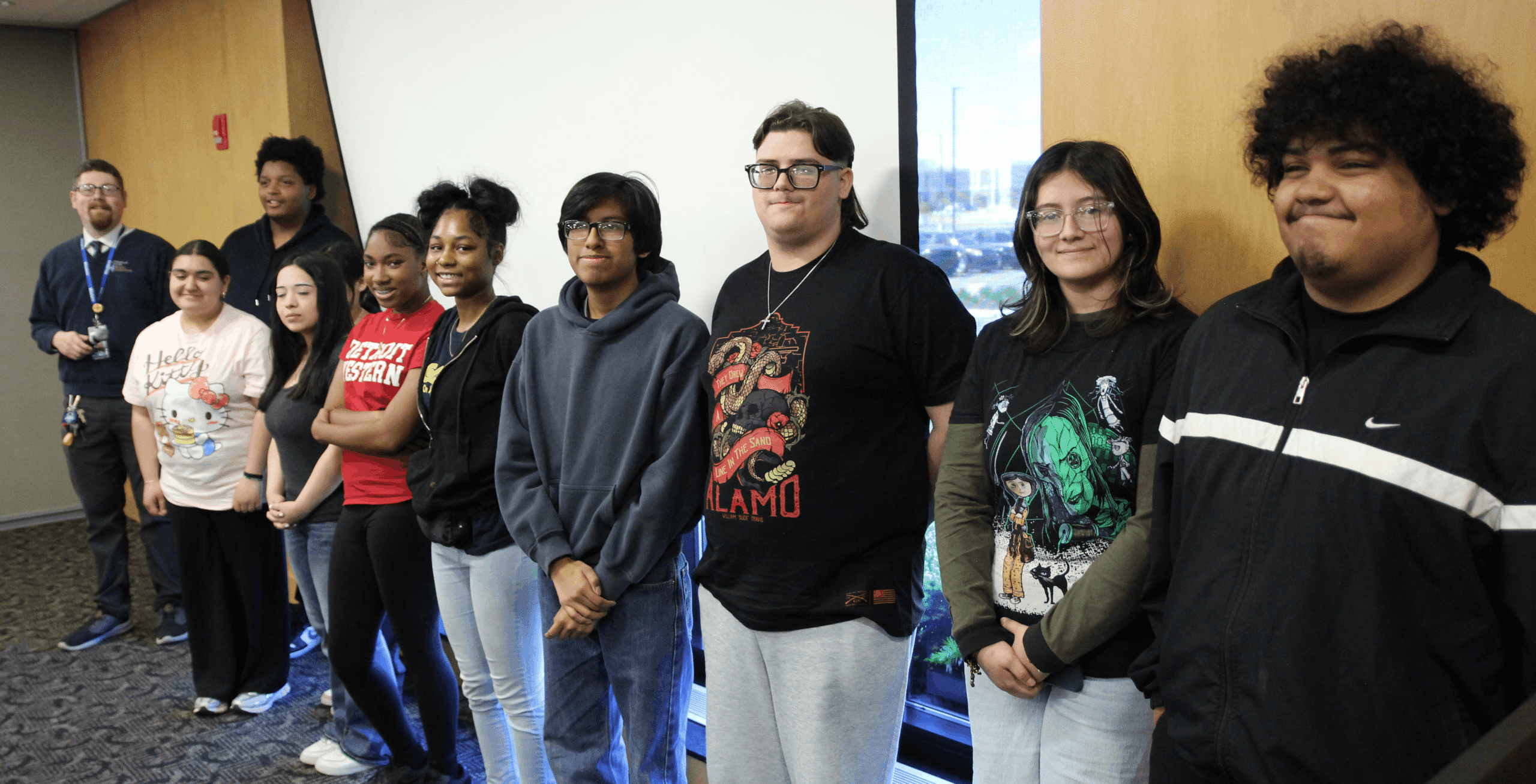 Group of students standing in row