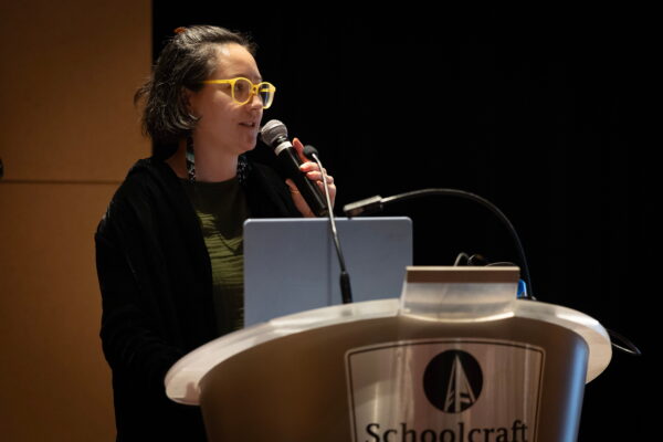 person speaking at podium